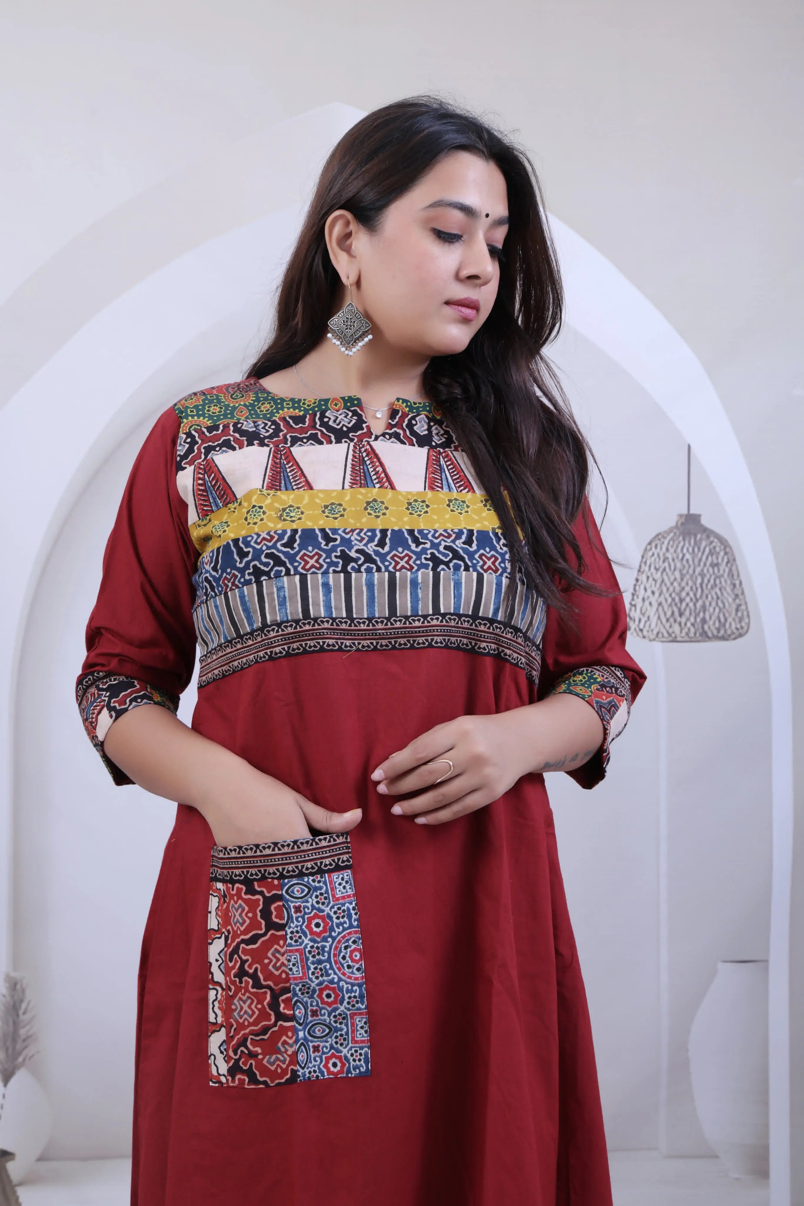 Arshvi Multi Ajarakh Maroon Cotton Pocket Kurti RAKHIYO