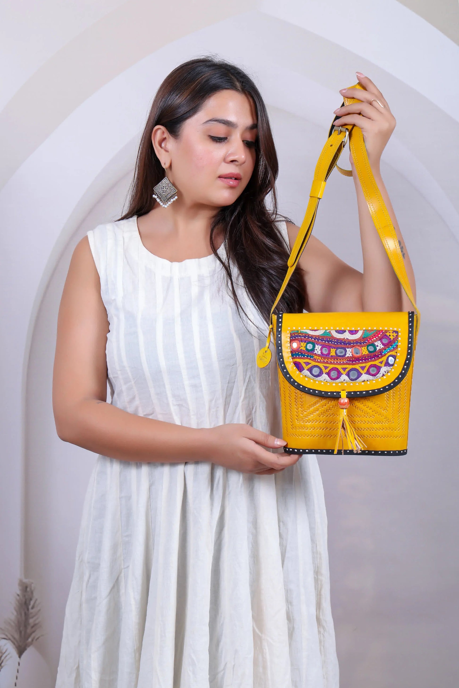 Punch Bucket Sling RAKHIYO