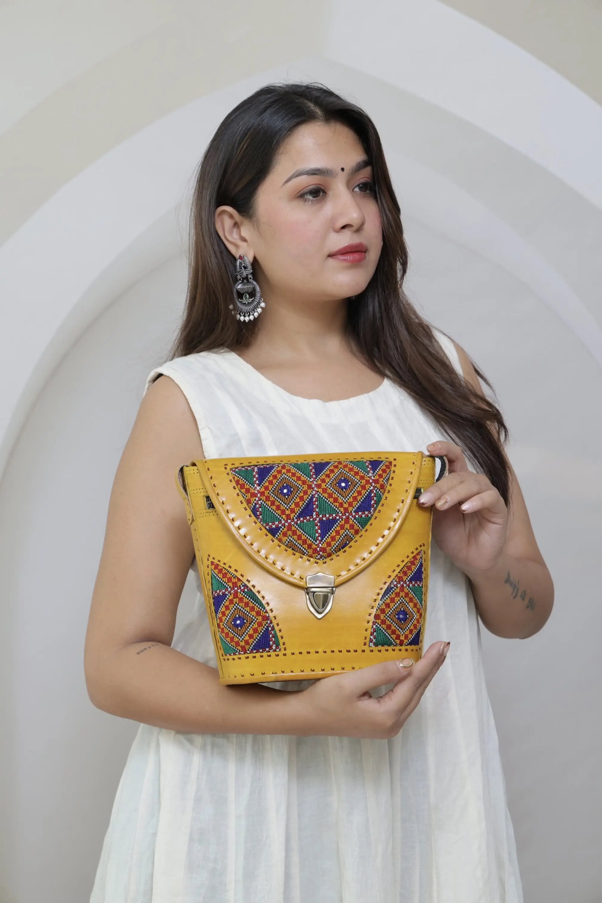 Yellow Tri-Handwork Jat Punching Bucket - The Sling RAKHIYO