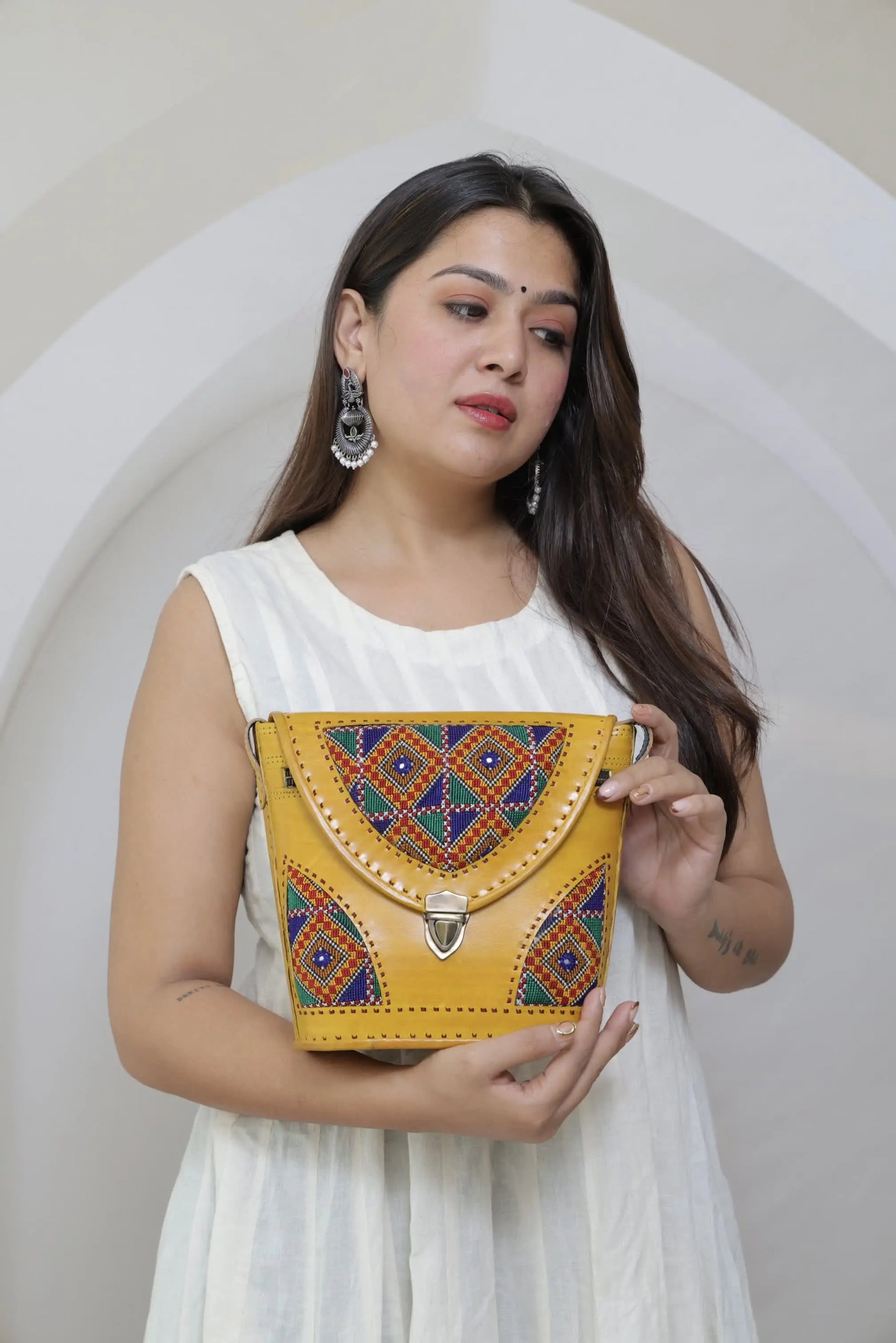 Yellow Tri-Handwork Jat Punching Bucket - The Sling RAKHIYO